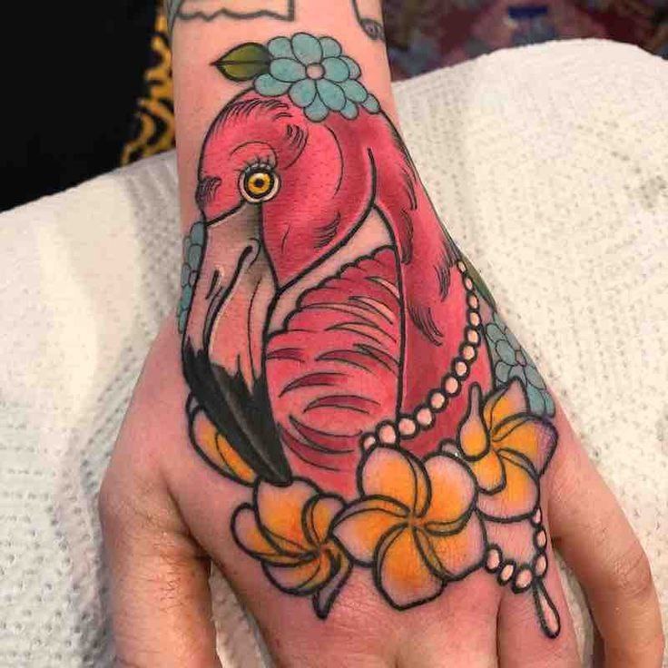 Large flamingo tattoo with flowers on the brush for men