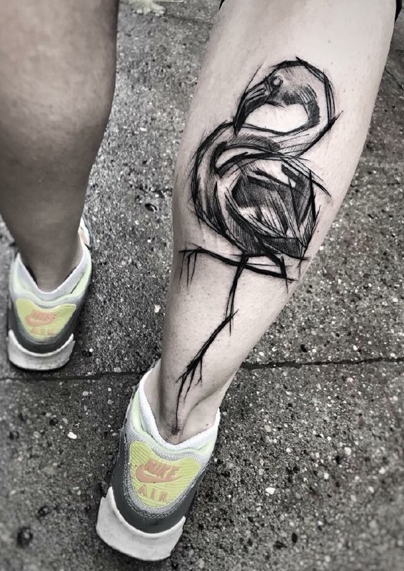 Large flamingo tattoo on the calf for men