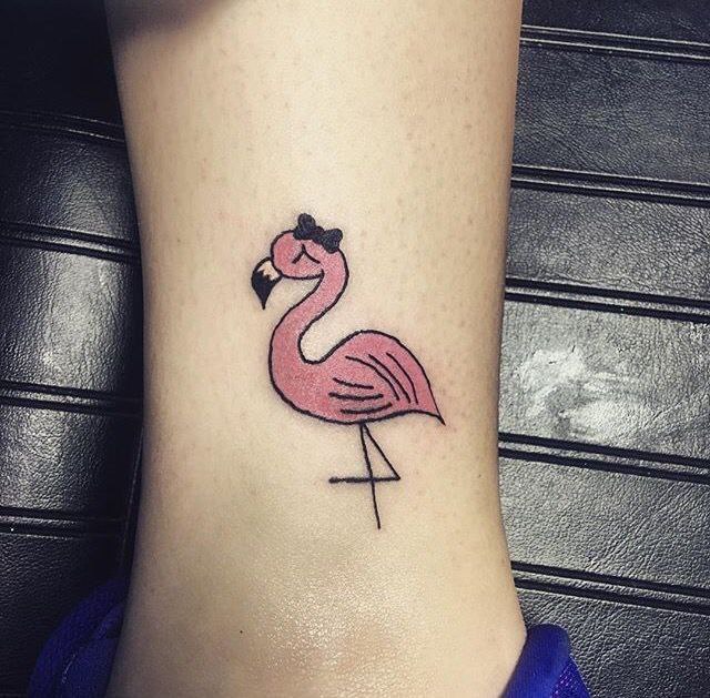 Color flamingo tattoo on the shin for women