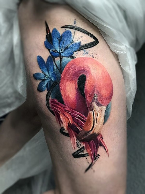 Large flamingo and flower tattoo on the thigh for women