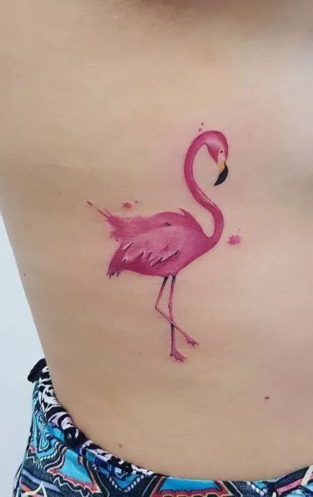 Color flamingo tattoo on the side for women