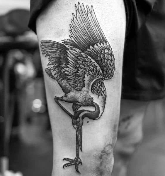 Large stork tattoo on the thigh for men