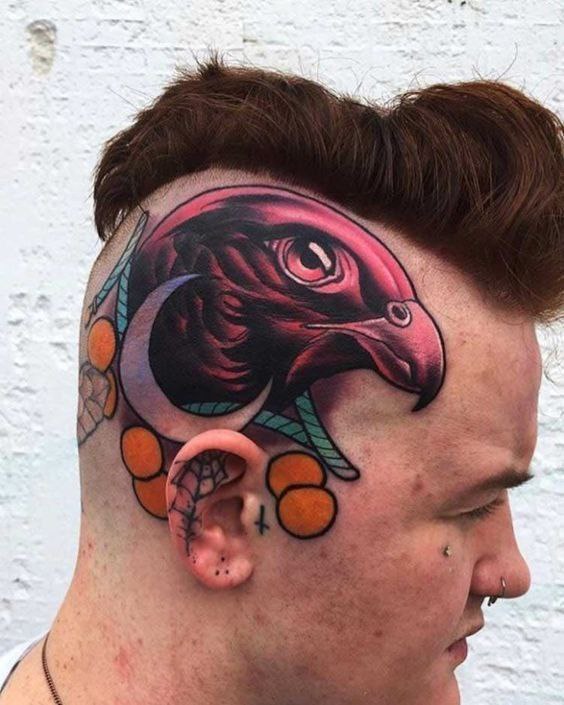 Large falcon tattoo on the head for men