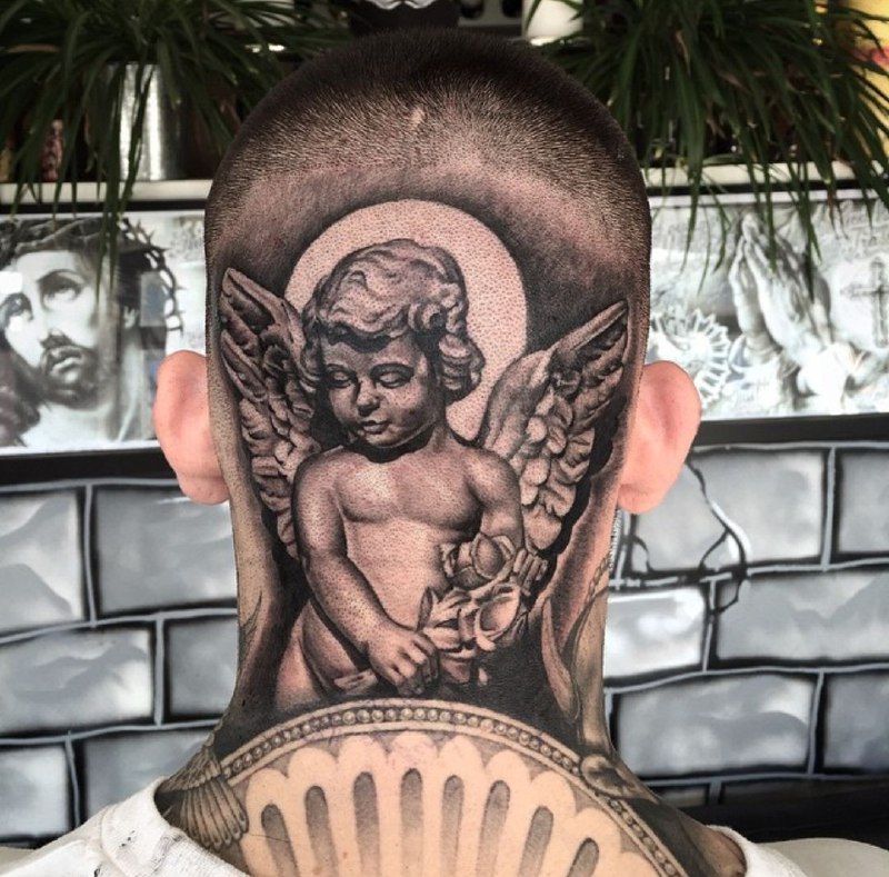 Large angel tattoo on the head for men