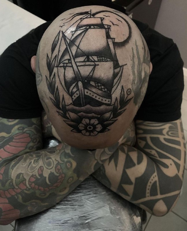 Large ship tattoo on the head for men