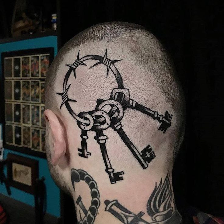 Large key tattoo on the head for men