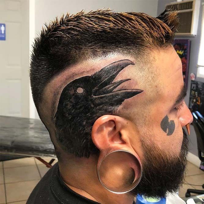 Large raven tattoo on the head for men