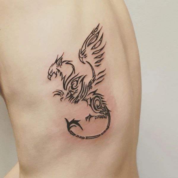 Tattoo of a griffin on the side for men