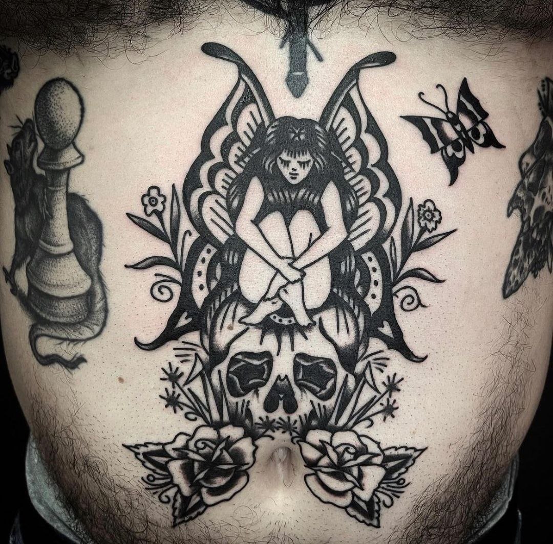 Large tattoo on the abdomen for men