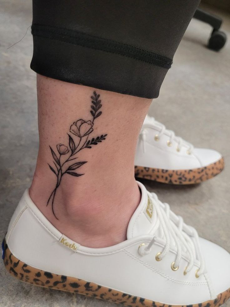 Ankle flower tattoo for women