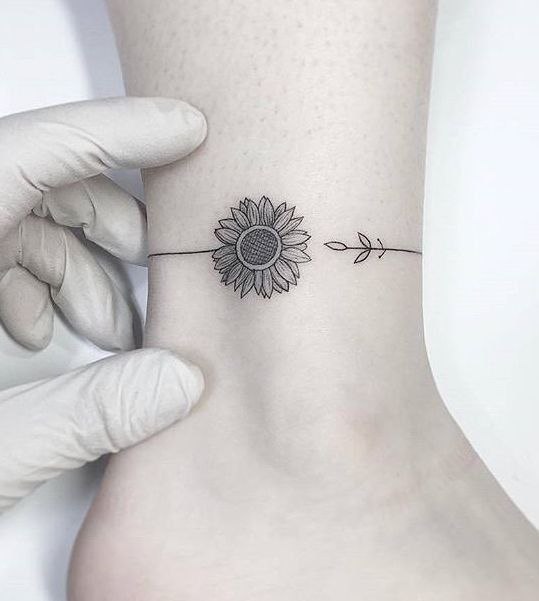 Ankle sunflower tattoo for women