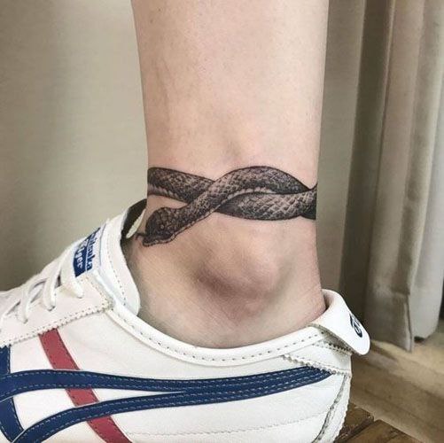 Ankle snake tattoo for men