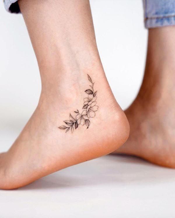 Ankle flower tattoo for women