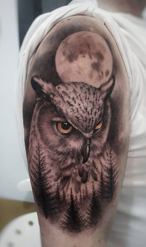 Large owl tattoo on the shoulder for men