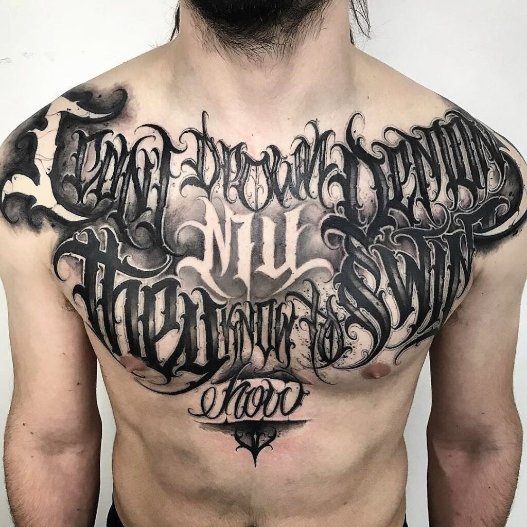 Calligraphy chest tattoo for men