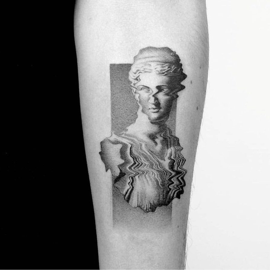 Apollo tattoo in the greek style on the forearm for men