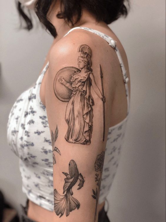 Greek-style tattoo on the shoulder for women