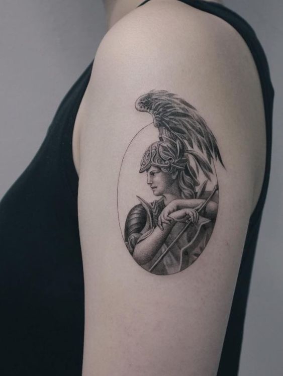 Greek-style tattoo on the shoulder for women