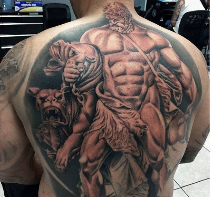 Large greek-style Hercules tattoo on the back for men