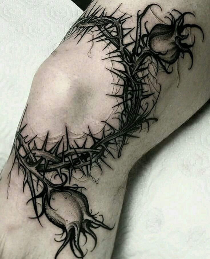 Tattoo on the knee for men