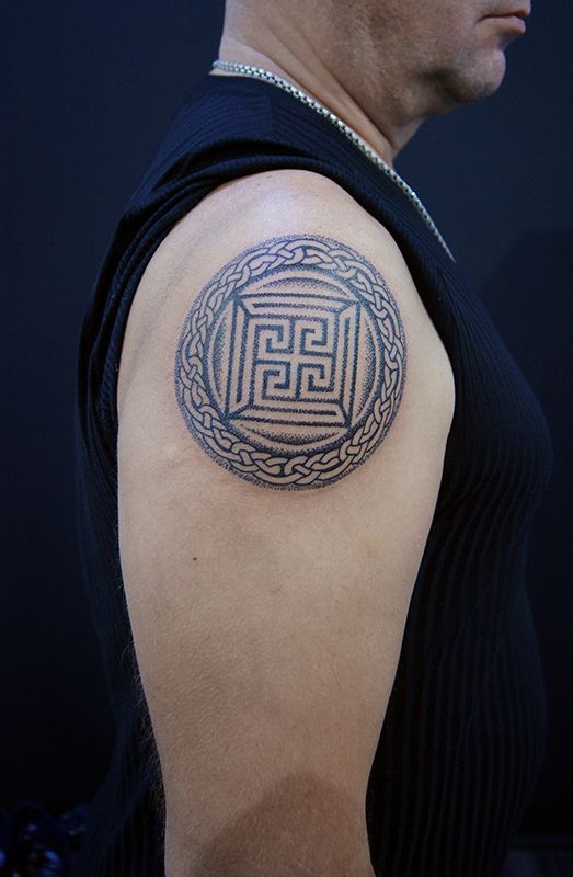 Celtic tattoo on the shoulder for men