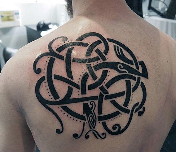 Celtic style tattoo on the back for men