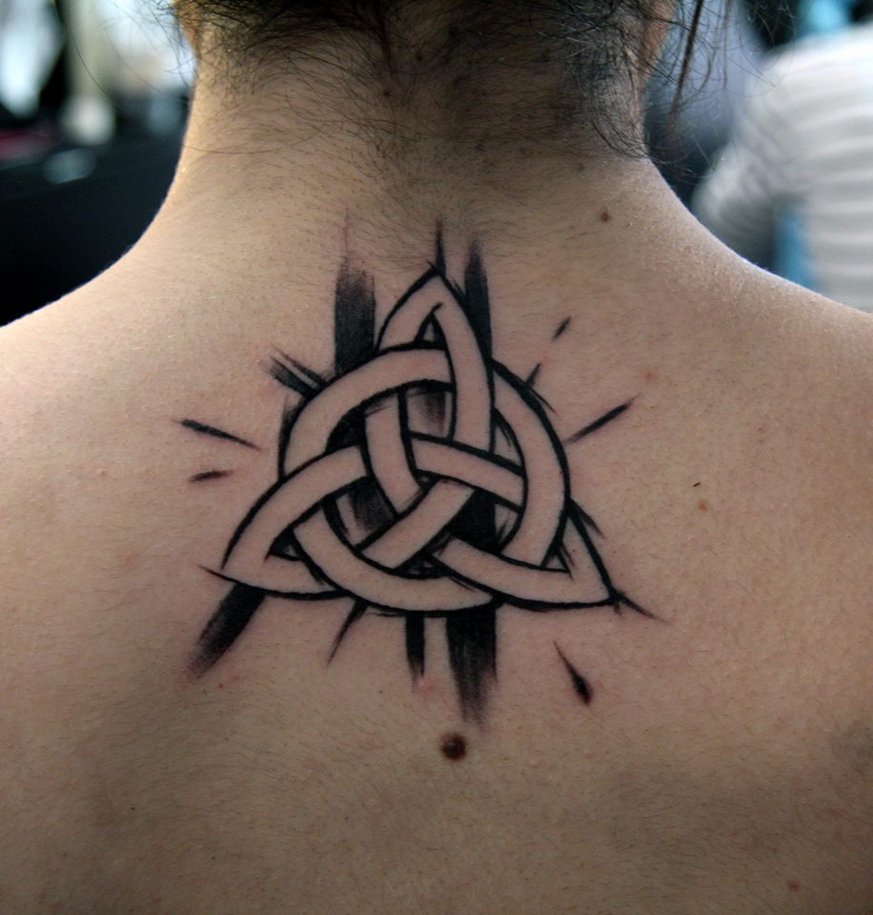 Celtic style tattoo on the back for men