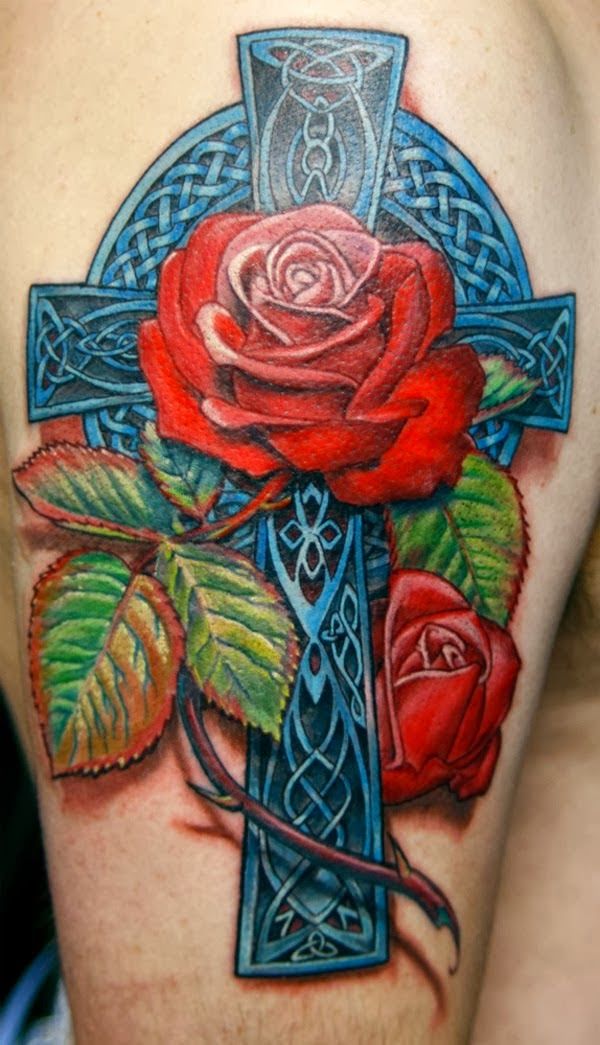 Colored celtic tattoo on the shoulder for men