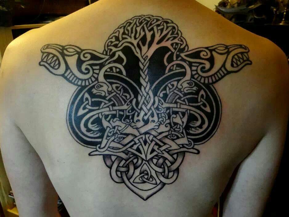 Celtic style tattoo on the back for men