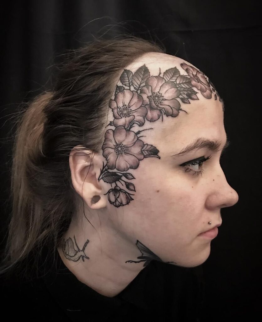 Large flower tattoo on the face for women