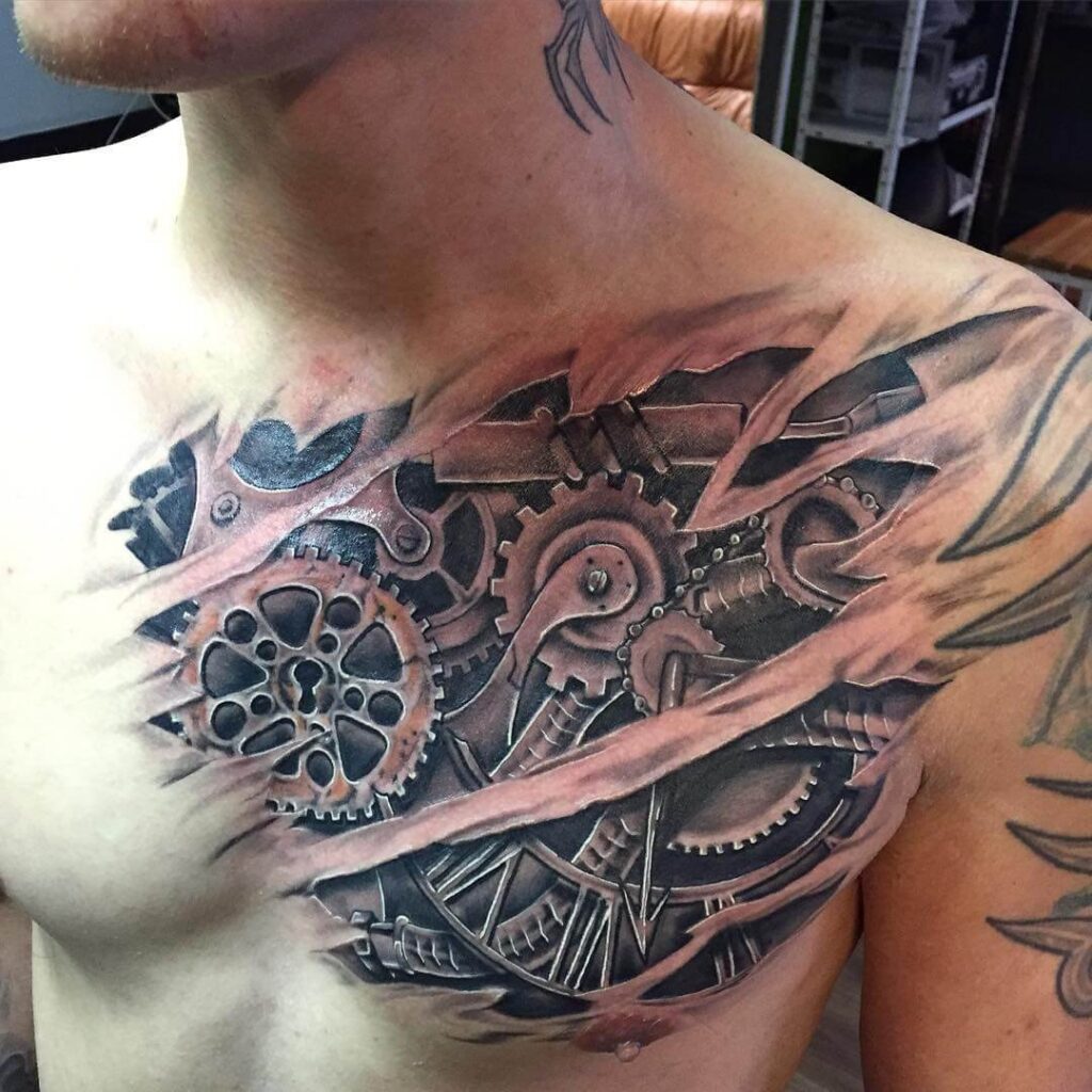 Biomechanics style tattoo on the chest for men