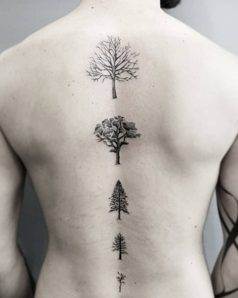 Tree tattoo on the spine for men