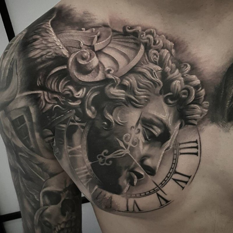 Baroque tattoo on the chest for men