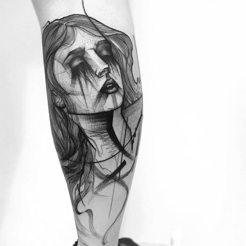 Large graphic style girl tattoo on calves for men