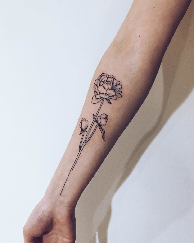 Peony tattoo on the arm for women