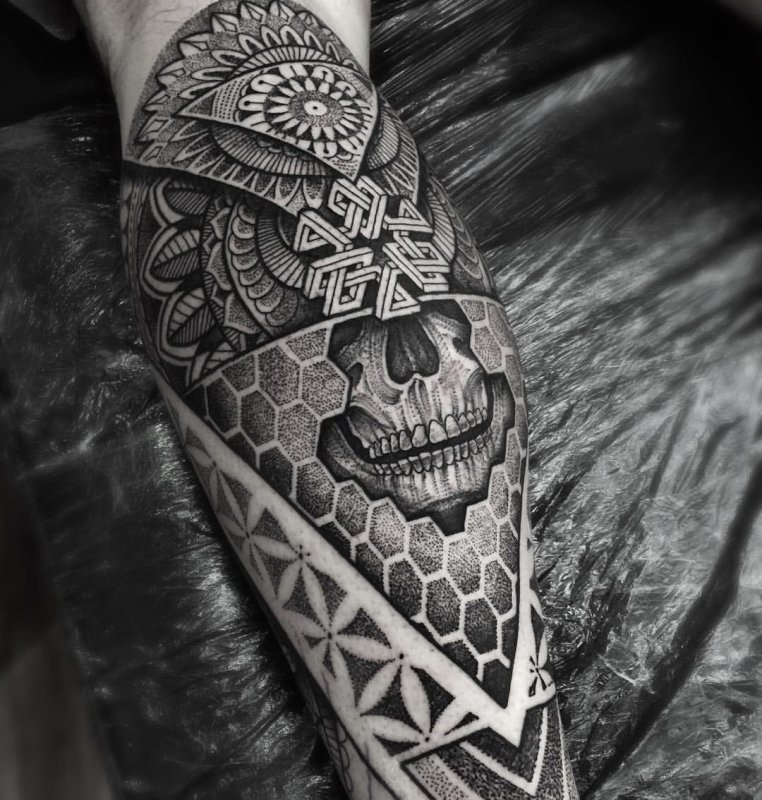 Dotwork style tattoo on calves for men