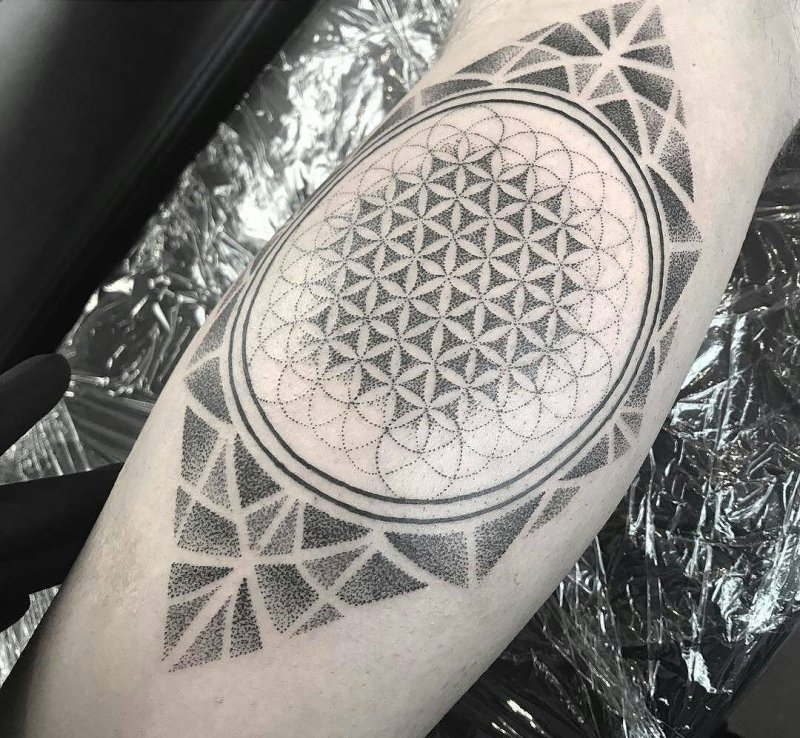 Dotwork style tattoo on calves for men