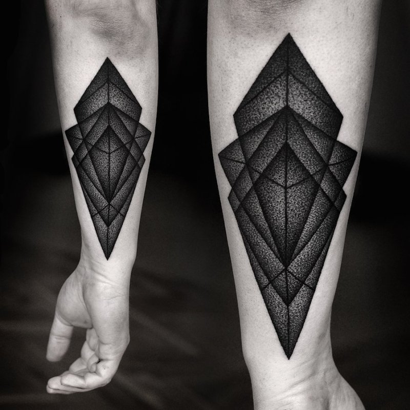 Tattoo in dotwork style on the forearm for men