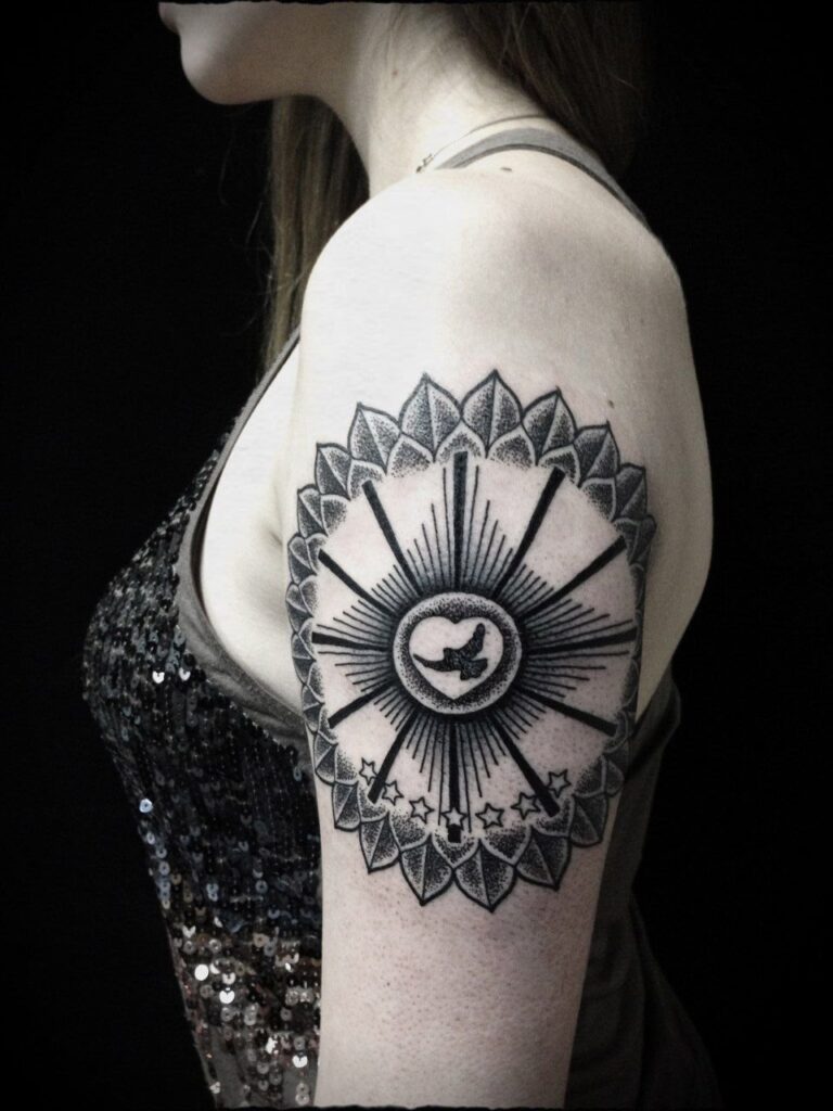 Dotwork tattoo on the shoulder for women