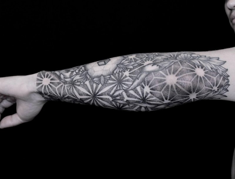 Tattoo in dotwork style on the forearm for men