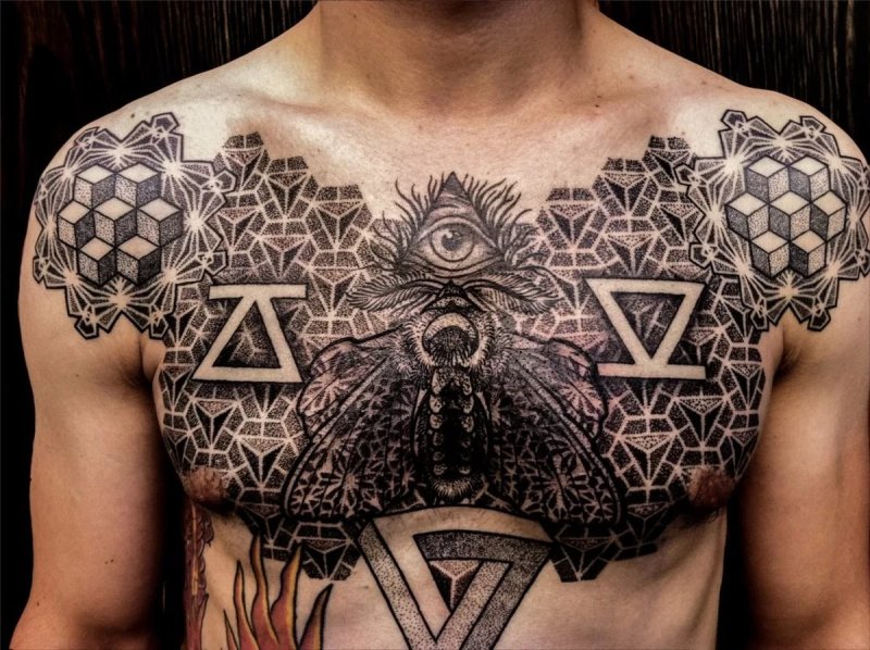 Large dotwork-style tattoo on the chest for men