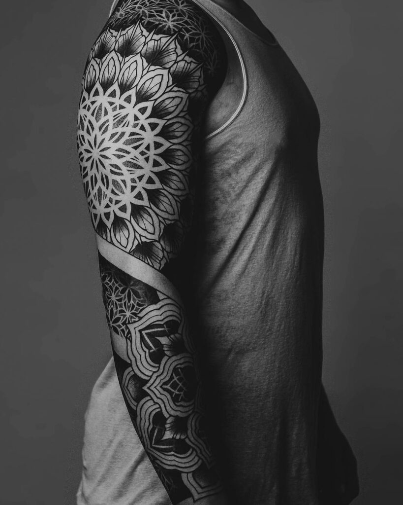 Blackwork tattoo on the arm for men