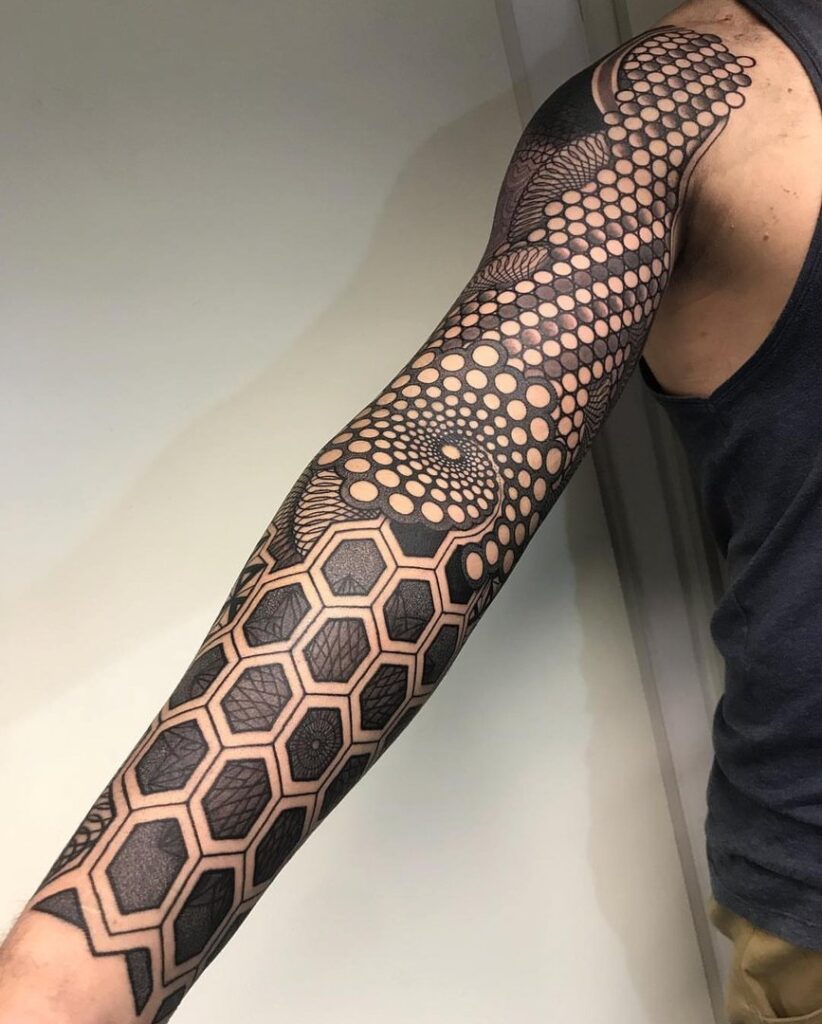 Blackwork tattoo on the arm for men