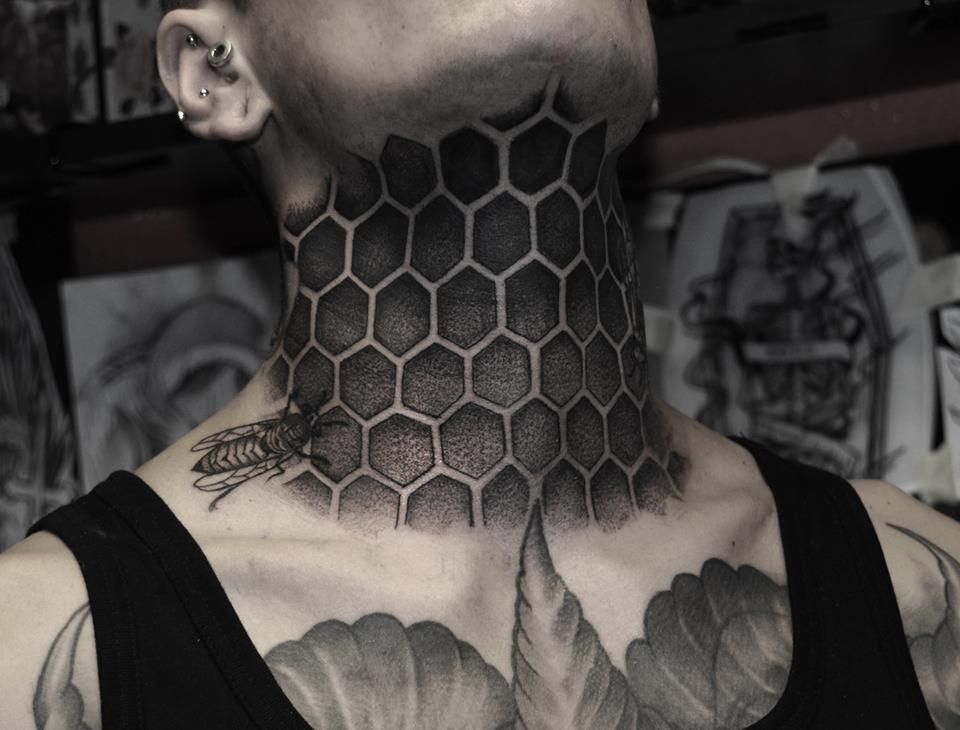 Blackwork neck tattoo for men