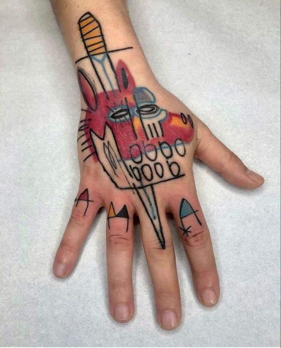 Art brut style tattoo on the hand for men