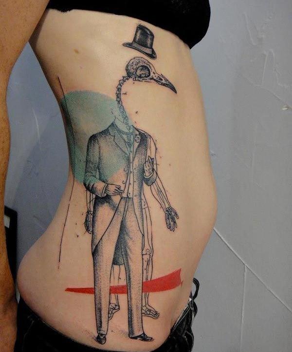 Art brut tattoo on the side for women