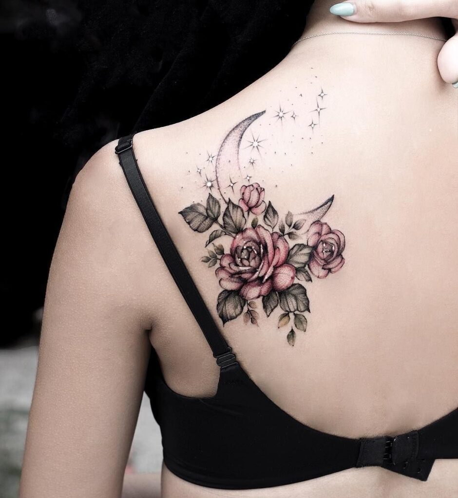 Rose tattoo on the shoulder blade for women