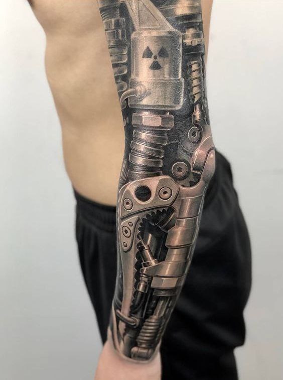 Biomechanics style tattoo on the arm for men