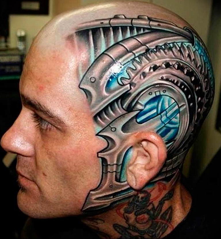 Colored tattoo in the style of biomechanics on the head for men