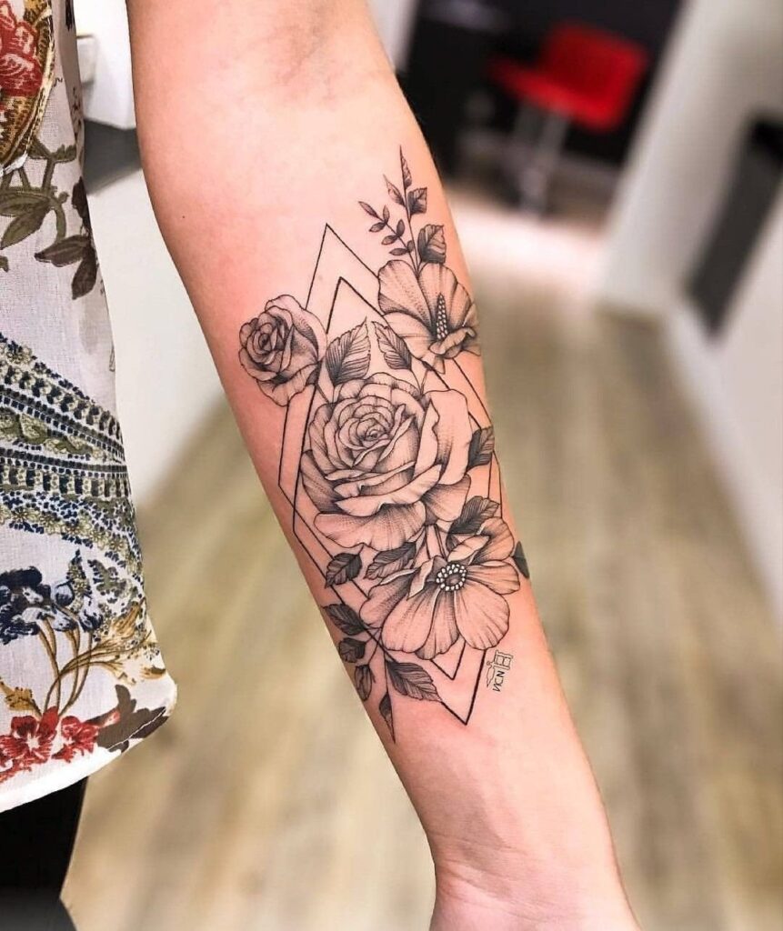 Flower tattoo on the forearm for women